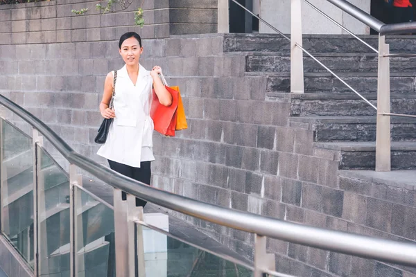 Happy woman with shopping bags enjoying in shopping. women shopping, lifestyle concept