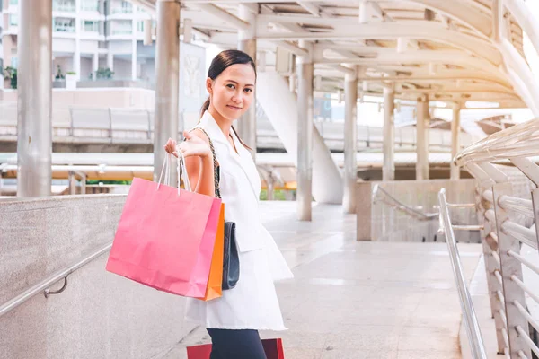 Happy woman with shopping bags enjoying in shopping. women shopping, lifestyle concept