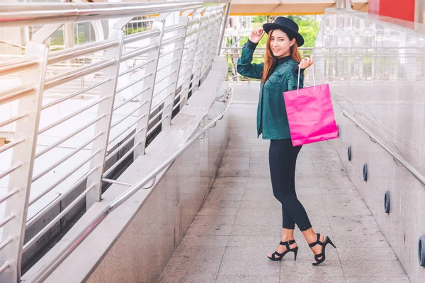 Happy woman with shopping bags enjoying in shopping. women shopping, lifestyle concept