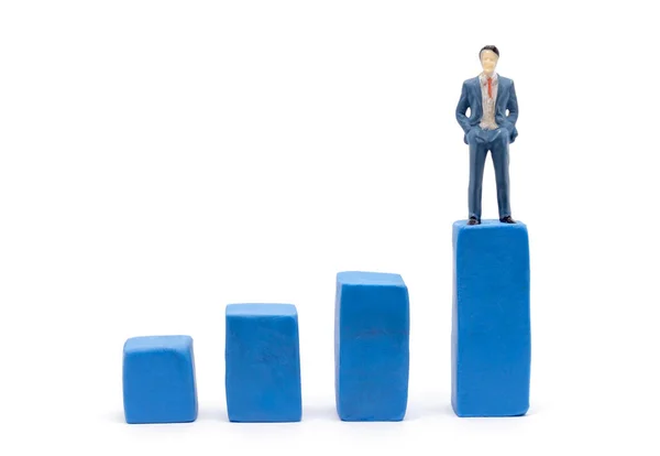 Miniatur Geschäftsmann Und Grafik Auf Weißem Hintergrund Geschäftswachstums Konzept — Stockfoto