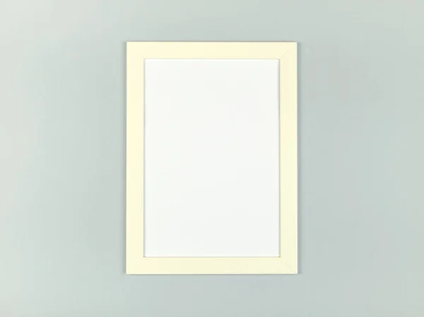 Empty picture frame on textured pastel colored background. Abstract minimalist composition