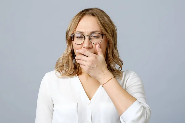 Portrait of tired sleepy girl yawning isolated — Stock Photo, Image