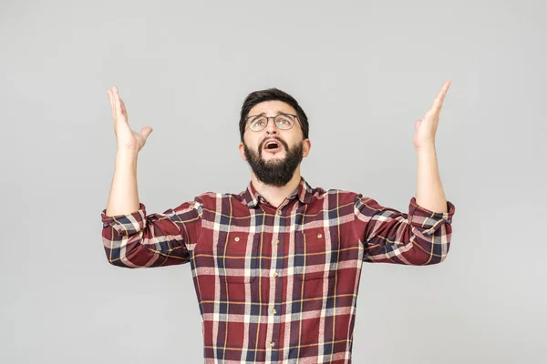 Homem confuso pedindo do Céu levantando a mão — Fotografia de Stock