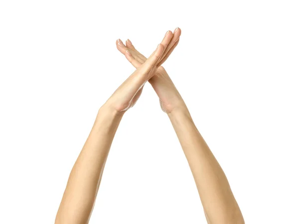 交叉的手 女人的手与法国修指甲的姿势隔离在白色背景 系列的一部分 — 图库照片