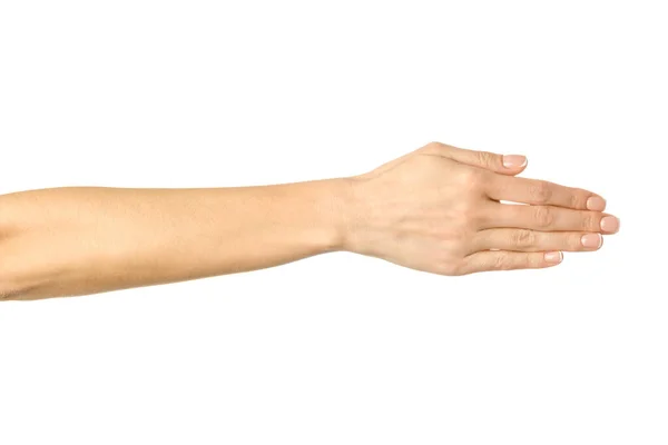 Dar a mão por aperto de mão. Mulher mão gestual isolado no branco — Fotografia de Stock