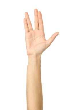 Vulkan selamı. Beyaz arka planda izole edilmiş Fransız manikürlü kadın eli. Dizinin bir parçası