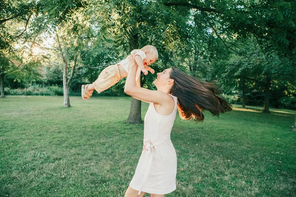 Young Mother Spinning Toddler Baby Boy Outdoor Parent Playing Child — Stock Photo, Image