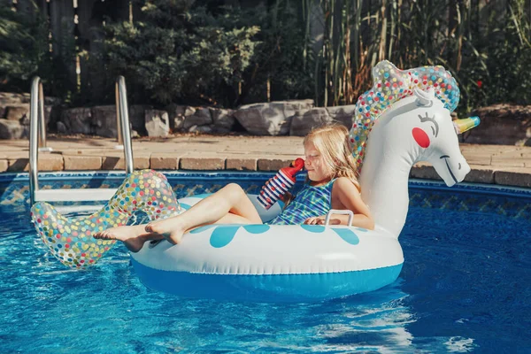Cute Adorable Girl Sunglasses Drink Lying Inflatable Ring Unicorn Kid — Stock Photo, Image