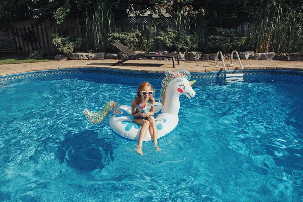 Cute Adorable Girl Sunglasses Drink Lying Inflatable Ring Unicorn Kid — Stock Photo, Image