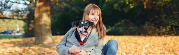 Happy Young Caucasian Woman Hugging Dog Park Owner Pet Autumn — Stock Photo, Image