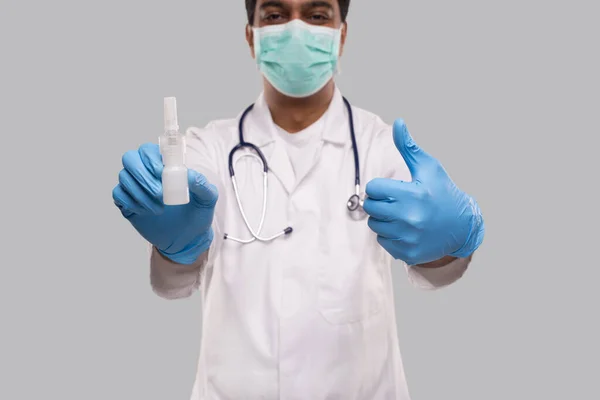 Doctor Showing Nose Spray Thumb Wearing Medical Mask Gloves Close — Fotografia de Stock