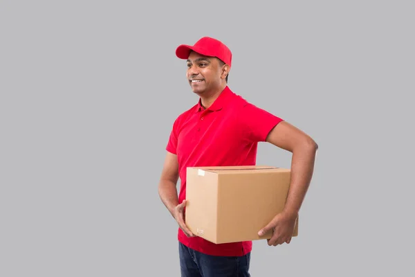 Delivery Man Holding Box Händerna Isolerade Red Tshirt Indian Delivery — Stockfoto