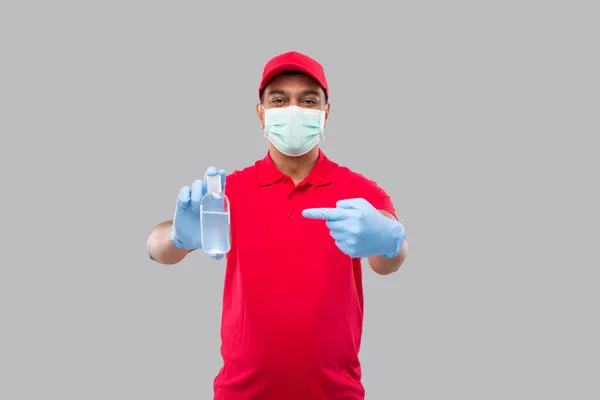 Delivery Man Ponting Hands Sanitizer Wearing Medical Mask Gloves Isolated — Stock Photo, Image