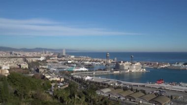 BARCELONA, SPAIN - CIRCA 2019: Panorama of Barcelona from Montjuic hill. Barcelona skyline. Embankment and port In Barcelona, Spain.