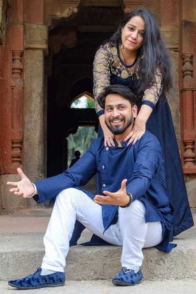 New Delhi India  November 25 2019 - A couple pose for Pre Wedding shoot inside Lodhi Garden Delhi, a popular tourist landmark in New Delhi India, for their pre wedding shoot, Pre-wedding photo shoot