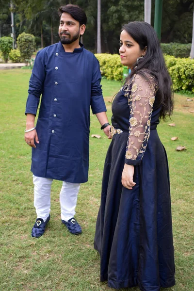 New Delhi India  November 25 2019 - A couple pose for Pre Wedding shoot inside Lodhi Garden Delhi, a popular tourist landmark in New Delhi India, for their pre wedding shoot, Pre-wedding photo shoot