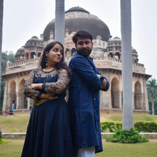 New Delhi India  November 25 2019 - A couple pose for Pre Wedding shoot inside Lodhi Garden Delhi, a popular tourist landmark in New Delhi India, for their pre wedding shoot, Pre-wedding photo shoot