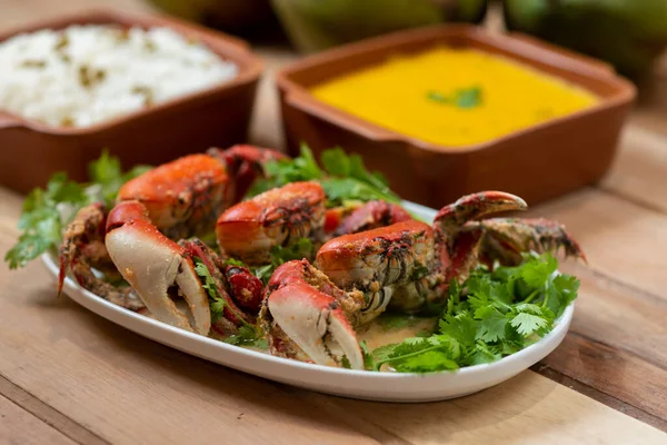 Crab in coconut sauce. Typical delicacy served in restaurants and tents on the beaches of northeastern Brazil.