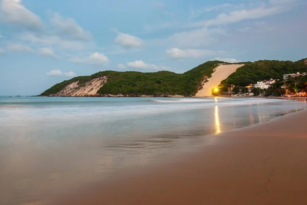 Ponta Negra beach, with Morro do Careca in the background, in the late afternoon, Natal, Rio Grande do Norte, Brazil on February 19, 2008.