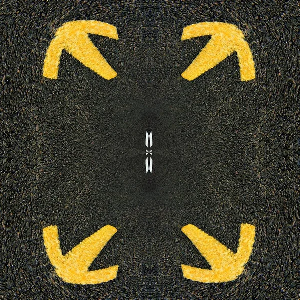 bright white direction arrow and a new black clean asphalt road surface with yellow lane markings