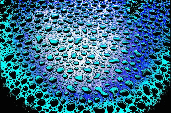 强烈蓝光下不同雨滴的摄影 — 图库照片