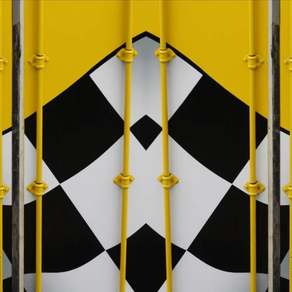 traditional motor sport chequered flag winning icon on bright yellow background patterns and designs