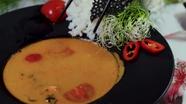 Tasty Tom Yum soup with shrimps and coconut milk — Stock Footage Tasty Tom Yum soup with shrimps and coconut milk Royalty Free Stock Video