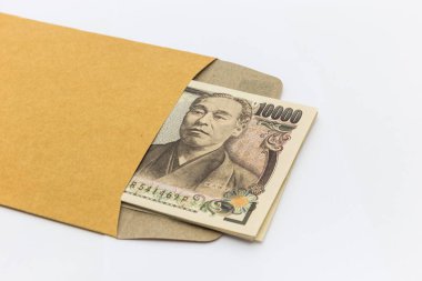 Japon banknot kahverengi zarf içinde 10.000 ¥ vermek ve iş başarı ve alışveriş için. İş kavramı