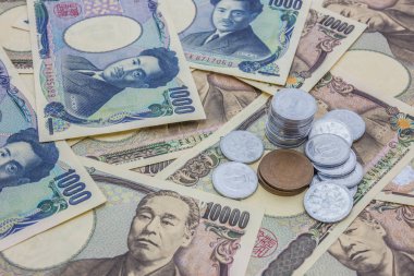 Tatlı Japon yeni banknot ve Japon yeni madeni para kavramı arka plan