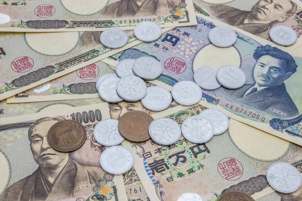 日本円紙幣 日本円硬貨コンセプト背景のクローズ アップ — ストック写真