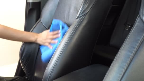 Woman Hand Cleaning Car Wax Blue Microfiber Cloth — Stock Video