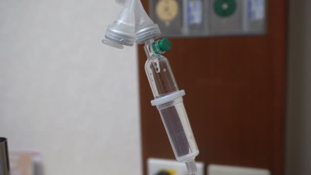 Doctor Adjusted Volume Rate Drip Hospital Intravenous Saline Solution Loading — Stock Video