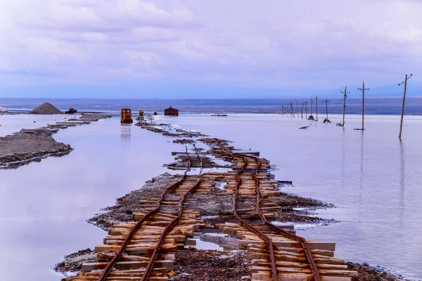 Chaka Salt Lake landscape with blue sky, Railway tracks in chaka salt lake.is located in Qinghai Province, China.