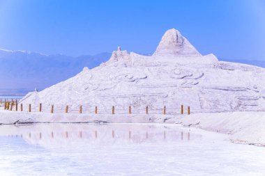 Chaka Salt Lake landscape with blue sky, is located in Qinghai Province, China. clipart