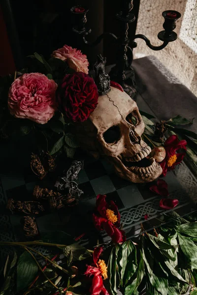 Skull Flowers Table Stock Photo