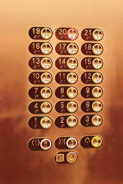 Illustration. Elevator buttons with the number 20 enabled. Elevator Keyboard. Background space for inscription or logo