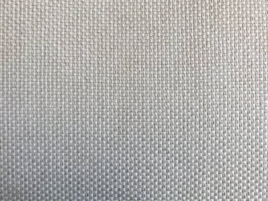 Gri kumaş dokusu. Seçici odak, yakın plan açık gri kumaş döşeme. Yünün lifli yapısı. Renkli tasarım. Metin kopyalamak için alanı olan duvar kağıdı ve arkaplan