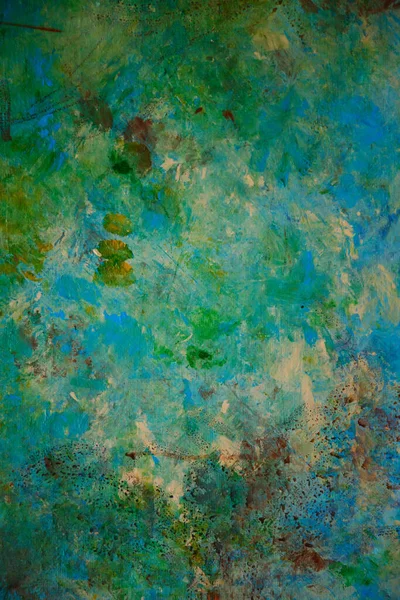 Grunge style textured classic color background. Art of abstract painted walls in old blue, green, yellow and beige colors. Color of grunge\'s texture. Amazing, modern, abstract. Copy space