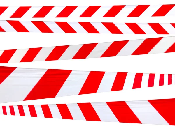 屏障带的红白警戒线禁止通过 白色隔离带的屏障带 禁止交通的障碍 危险危险危险区域警告不得进入 不可入内的概念 复制空间 — 图库照片