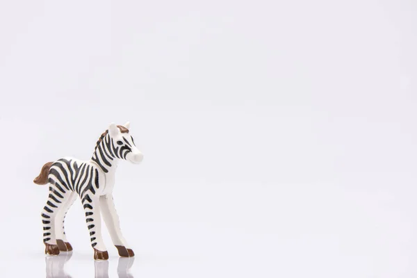 Close Plastic Stripped Zebra Isolated White Background — Stock Photo, Image