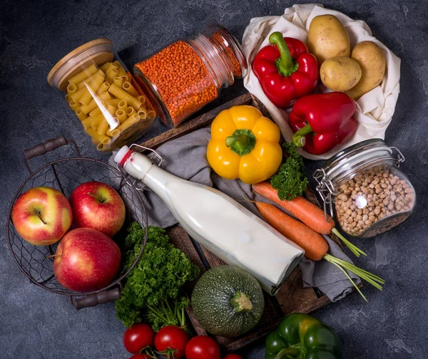 Healthy organic vegetables and food in reusable bag and glass ja