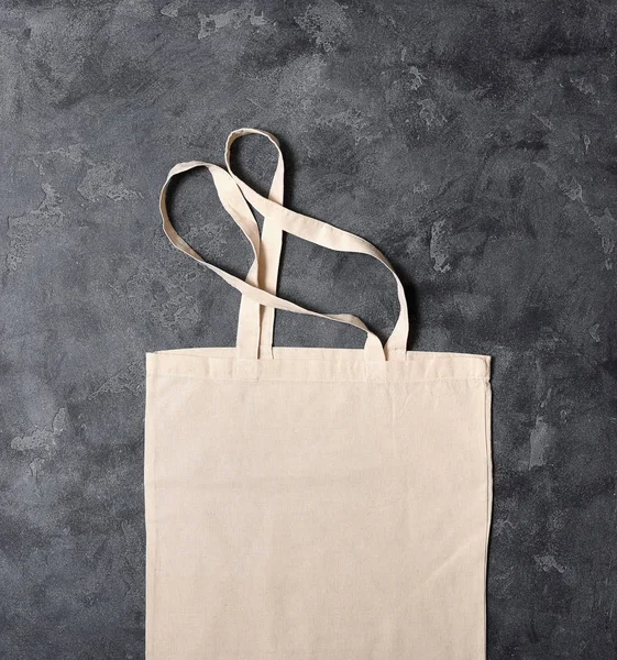 Reusable cotton bag flat lay, space for text, eco-friendly shopp