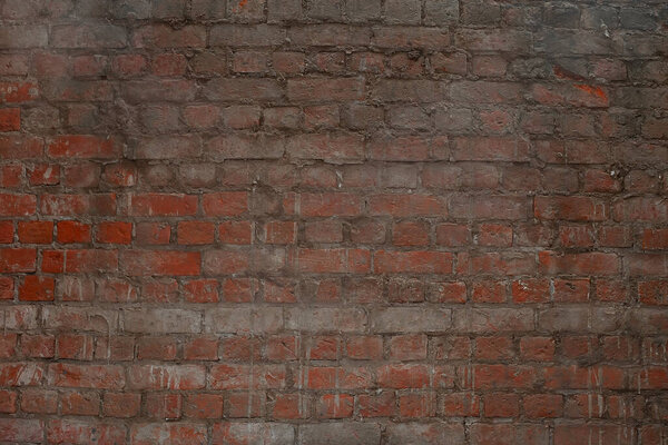 Выветриваемая текстура из окрашенного темно-коричневого и красного кирпичного фона, ржавые блоки технологии обработки камня.