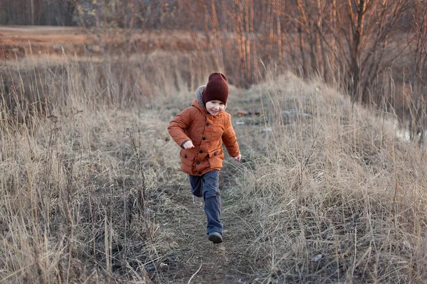 Little Boy Red Jacket Held Out His Hand Autumn Field — Stock Photo, Image