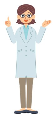 Duran kadın doktor gülümseyerek anlatıyor..