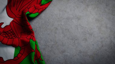 Flag of Wales on concrete backdrop. Welsh flag background with copy space clipart