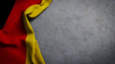 Beton zemin üzerinde Almanya bayrağı. Kopyalama alanı olan Alman bayrağı arkaplanı