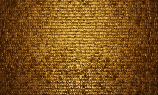 黄金のフェイクワニ革の背景 — ストック写真