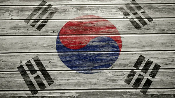 悬挂在风化木板上的韩国国旗 — 图库照片