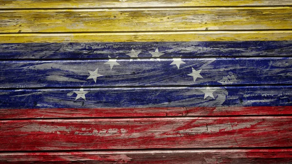 Venezuela flag painted on weathered wood planks